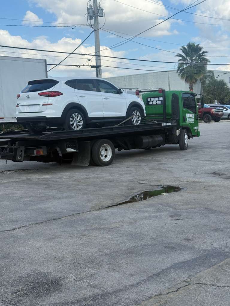 Grúa de plataforma Prim Towing en servicio
